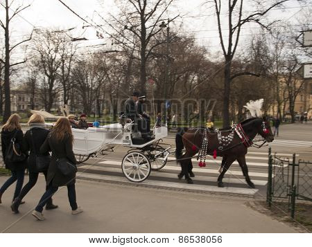 Krakow, Poland - March 29, 2015: Horse Carriage On The Streets Of The City