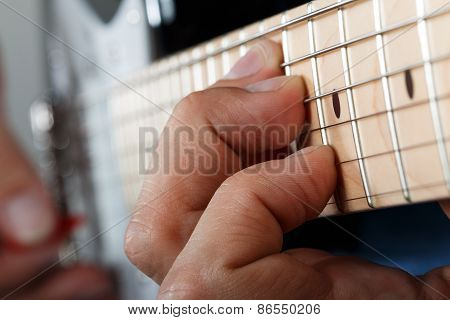 Hands Of Man Playing Electric Guitar