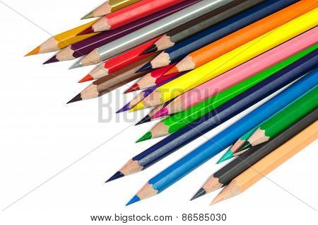 Scattered colored pencils isolated on white background