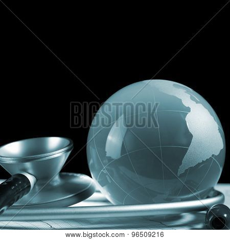 Map And Stethoscope Isolated On Black