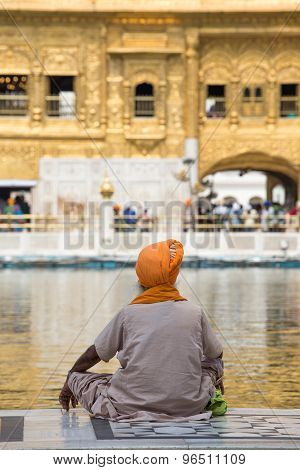 Sikh Man Visiting The Golden Temple In Amritsar, Punjab, India.