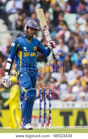 LONDON, ENGLAND - June 17 2013: Sri Lanka's Lahiru Thirimanne celebrates 50 runs during the ICC Champions Trophy international cricket match between Sri Lanka and Australia.