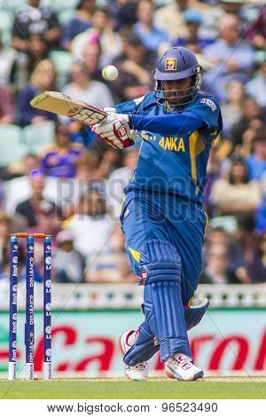 LONDON, ENGLAND - June 17 2013: Sri Lanka's Lahiru Thirimanne hits the ball during the ICC Champions Trophy international cricket match between Sri Lanka and Australia.