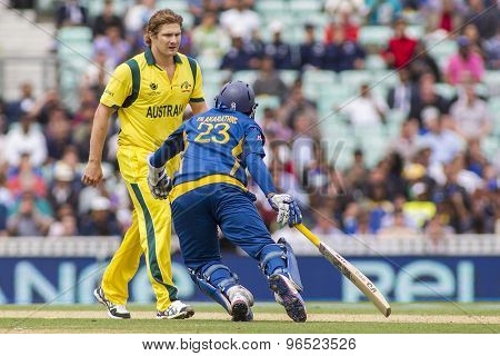 LONDON, ENGLAND - June 17 2013:  Australia's Shane Watson and Sri Lanka's Tillakaratne Dilshan during the ICC Champions Trophy international cricket match between Sri Lanka and Australia.