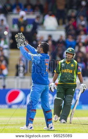 EDGBASTON, ENGLAND - June 15 2013: India's Mahendra Singh Dhoni during the ICC Champions Trophy cricket match between India and Pakistan at Edgbaston Cricket Ground.