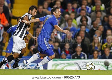 LONDON, ENGLAND. September 19 2012  Juventus's Montenegro forward Mirko Vucinic and Chelsea's midfielder Frank Lampard during the UEFA Champions League football match between Chelsea and Juventus