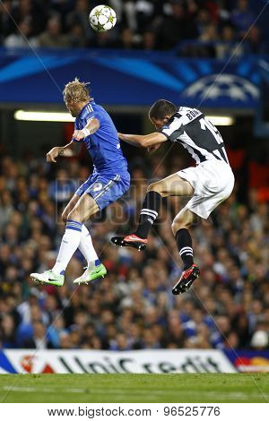 LONDON, ENGLAND. September 19 2012 Chelsea's forward Fernando Torres  and Juventus's Leonardo Bonucci compete for the ball during the UEFA Champions League football match between Chelsea and Juventus