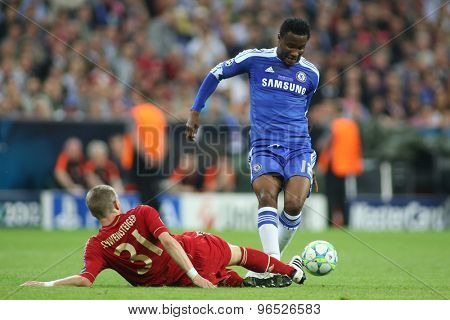 MUNICH, GERMANY May 19 2012. Bayern's German midfielder Bastian Schweinsteiger  and Chelsea's Nigeria midfielder John Obi Mikel in action during the 2012 UEFA Champions League Final