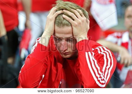 MUNICH, GERMANY May 19 2012. A dejected Bayern fan after his team lost the 2012 UEFA Champions League Final at the Allianz Arena Munich contested by Chelsea and Bayern Munich