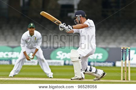 LONDON, ENGLAND. AUGUST 20 2012 England's Jonathan Trott hits a four during the third Investec cricket  test match between England and South Africa, at Lords Cricket Ground