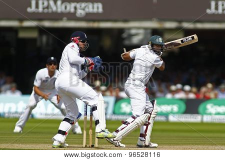 LONDON, ENGLAND. AUGUST 19 2012 South Africa's Hashim Amla hits four runs to go to his century during the third Investec cricket  test match between England and South Africa, at Lords Cricket Ground