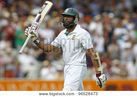 LONDON, ENGLAND. AUGUST 19 2012 South Africa's Hashim Amla walks off after being dismissed during the third Investec cricket  test match between England and South Africa, at Lords Cricket Ground