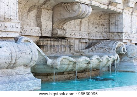Marble Fountain With Clear Blue Water In Rome, Italy