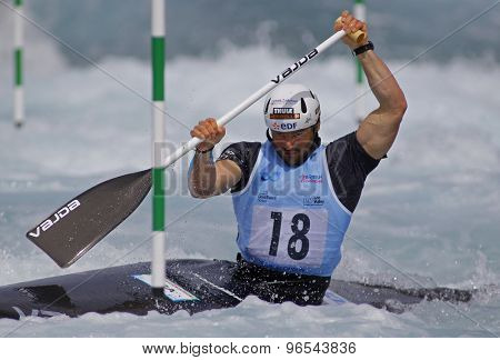 LONDON, ENGLAND - JUNE 06 2014 Nicolas Peschier of France competes at the ICF Canoe Slalom held at the Lea Valley White Water centre Waltham Abbey.