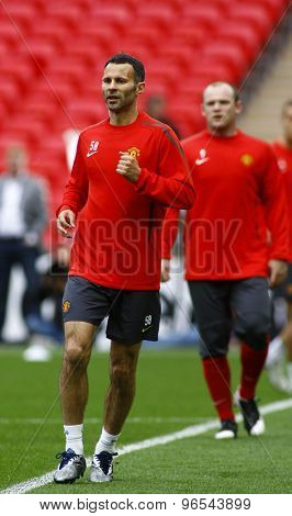 LONDON, ENGLAND. May 27 2011:  Manchester's midfielder Ryan Giggs and Wayne Rooney during the official training session for the 2011UEFA Champions League final 