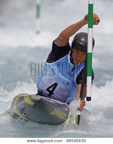 LONDON, ENGLAND - JUNE 06 2014 Anze Bercic of Slovenia competes at the ICF Canoe Slalom held at the Lea Valley White Water centre Waltham Abbey.