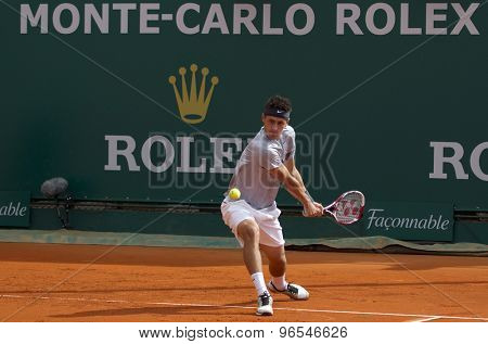 MONTE CARLO, MONACO. APRIL 18 2012 Bernard Tomic (AUS)  in action during the second round match between Bernard Tomic (AUS) and Alexandr Dolgopolov (UKR)  at the ATP Monte Carlo Masters  .