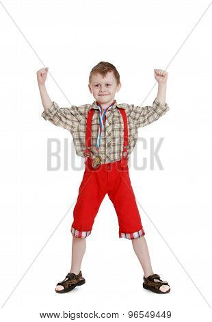 boy in a long red shorts