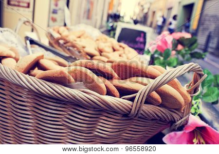 closeup of a wicker basket with cookies on sale in the old town of Marseille, France