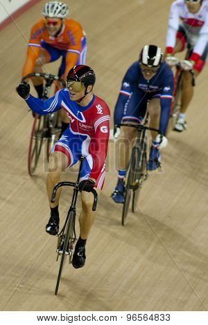 LONDON, ENGLAND. FEBRUARY 18 2012: Sir Chris Hoy (GBR) celebrates winning the men's Keirin at the UCI Track Cycling World Cup at the London Velodrome, Queen Elizabeth 2nd Park