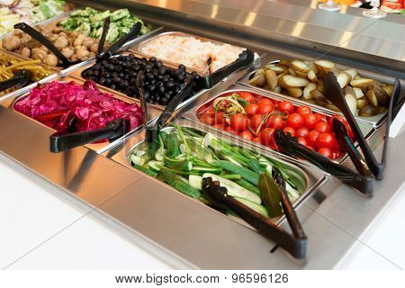 Pickled vegetables on self service restaurant counter