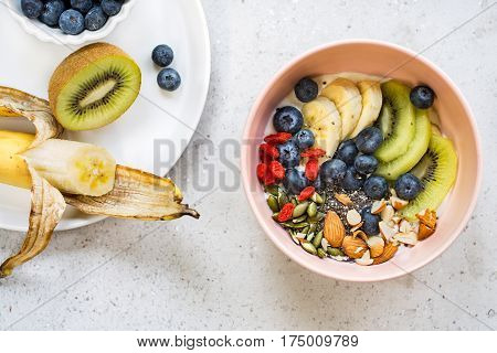 Blueberries,Kiw,iAlmond,Goji berries and Chia seed on Greek yogurt