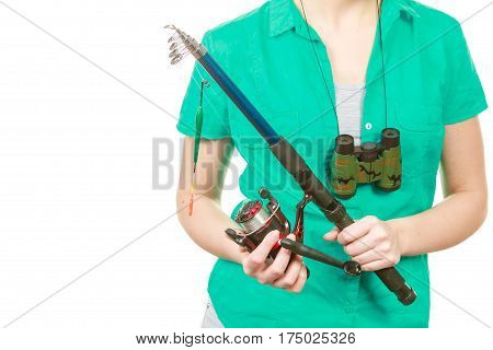 Spinning sport equipment concept. Person holding fishing rod with float and waggler with line.