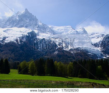 Mont Blanc Mountain covered with snow in spring. Amazing panorama of French Alps in the spring