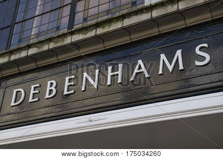 CANTERBURY UK - FEBRUARY 13TH 2017: A sign for the Debenhams department store in the city of Canterbury in the UK on 13th February 2017.