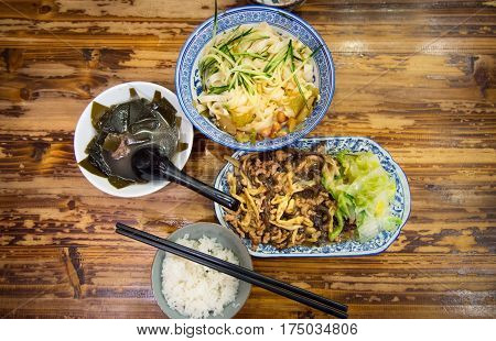 Noodles, Kelp Soup And Sliced Pork Fried With Vegetables