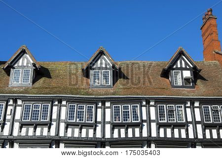 A view of the Tudor exterior of one of the many traditional buildings in the historic city of Lincoln in the UK.