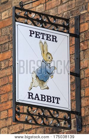 STRATFORD-UPON-AVON UK - MARCH 2ND 2017: A Peter Rabbit sign above a shop in the historic town of Stratford-Upon-Avon in the UK on 2nd March 2017.