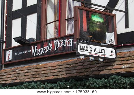 STRATFORD-UPON-AVON UK - MARCH 2ND 2017: The sign above The Enchanting World of Wizards Thatch and Magic Alley shop in Stratford-Upon-Avon on 2nd March 2017.