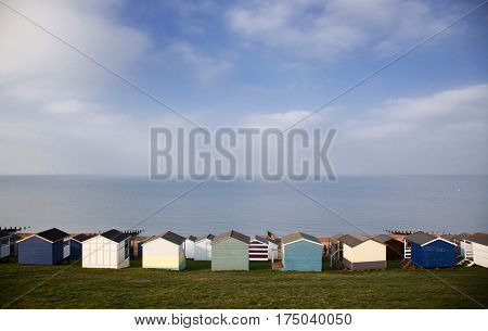 colored beach huts on the beach of Tankerton near Whitstable in Kent, UK