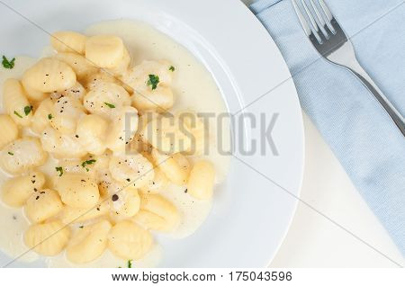 potato gnocchi with fontina cream from italy