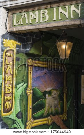 NORWICH UK - JANUARY 17TH 2017: A view of the entrance to an alleyway that leads to the Lamb Inn public house in the historic city of Norwich on 17th January 2017.