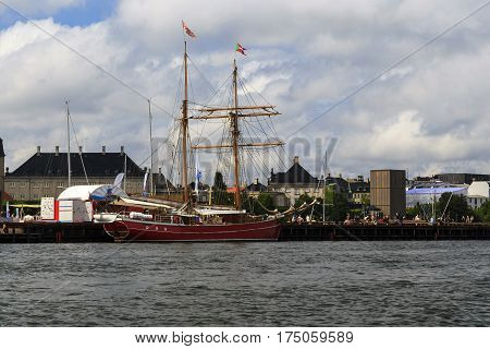COPENHAGEN, DENMARK - JUNE 29, 2016: This is a modern two-masted sailing ship at the city pier.