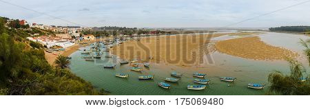 Panoramic view over the lagoon with fisher boats at Moulay Bousselham, Morocco, Africa.