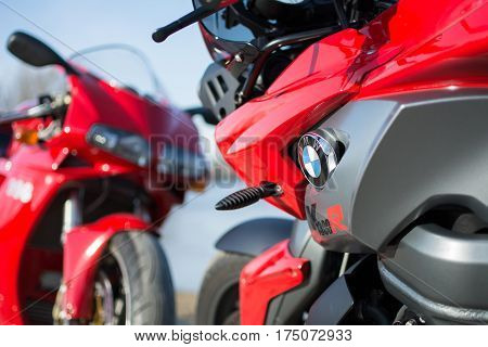 Senta Serbia: March 4th 2017. Closeup of beautiful BMW K1300R motorcycle photographed outdoor on a dock in Senta besides river. Ducati 996s in the back.