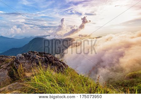 Beautiful landscape nature of high mountain colourful sunlight cloud and sky on Phi Pan Nam Range during sunset in winter from viewpoint Phu Chi Fa Forest Park at Chiang Rai Province Thailand