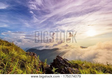 Beautiful landscape nature of high mountain colourful sunlight cloud and sky on Phi Pan Nam Range during sunset in winter from viewpoint Phu Chi Fa Forest Park at Chiang Rai Province Thailand