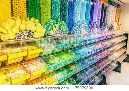 Candy bar and counter in the candy shop. Low light vivid image.