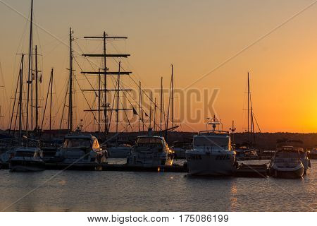 SOZOPOL, BULGARIA - JULY 11, 2016: Amazing Sunset at the port of Sozopol, Burgas Region, Bulgaria