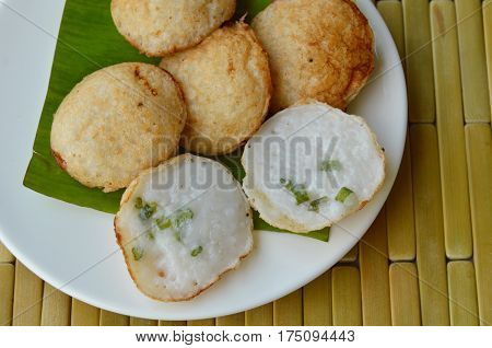 Thai sweetmeat coconut pudding on white dish