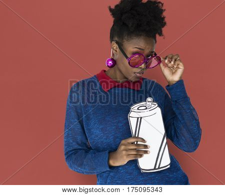 African Woman with Sunglasses Holding a Can Beverage