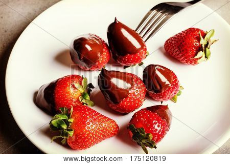 Juicy strawberry with milk chocolate