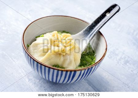Traditional Caucasien Manti as close-up on a bowl