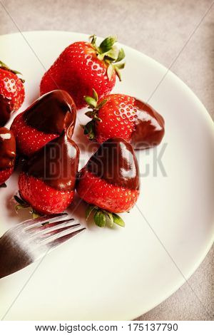 Juicy strawberry with milk chocolate