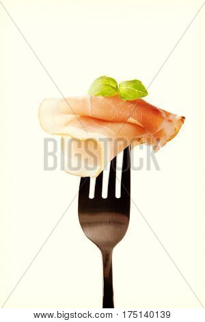 Black forest ham on fork