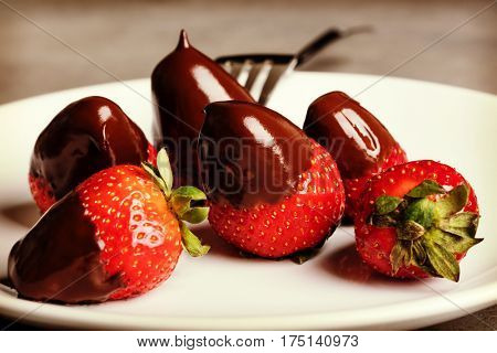Juicy strawberry with milk chocolate